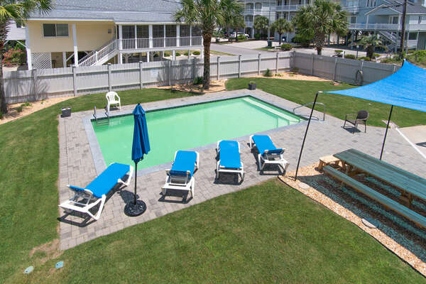 Absolute Paradise vacation home on a channel of the Cherry Grove Inlet in North Myrtle Beach | pool view 1 | Thomas Beach Vacations