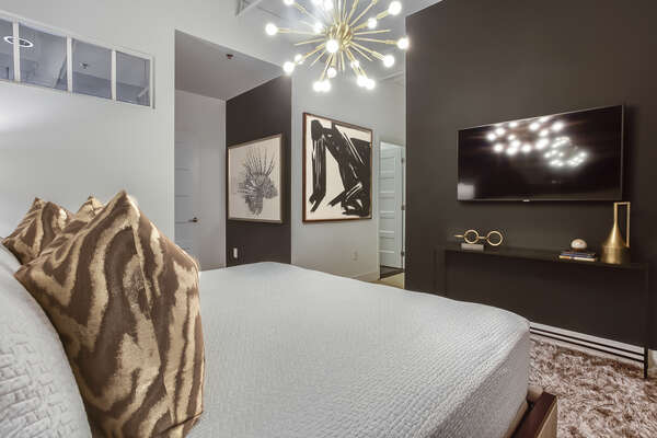Master Bedroom with Contemporary Furnishings at Ponce Cit Market Loft