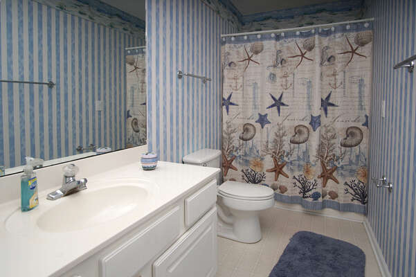5 O'Clock Poolside - waterfront vacation home on a channel of the Cherry Grove Inlet in North Myrtle Beach | bathroom 1 | Thomas Beach Vacations