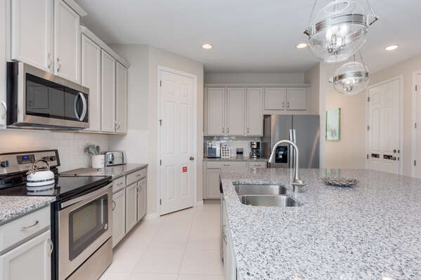 Stainless steel appliances in this stylish kitchen