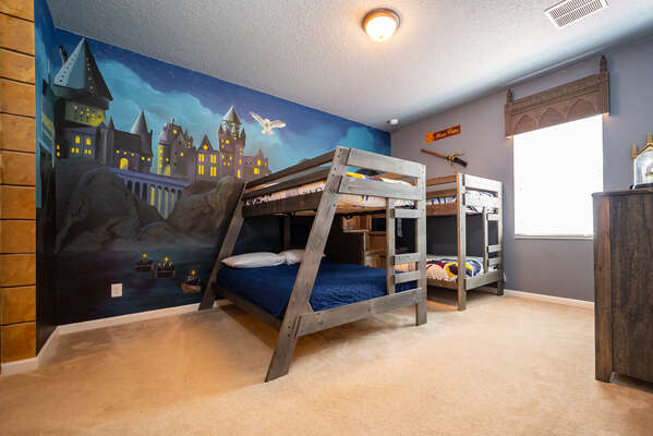 Bedroom 5 is a wizard themed room with dual bunkbeds