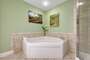 Private Master Bathroom with Double Sink Vanity and Jacuzzi Tub
