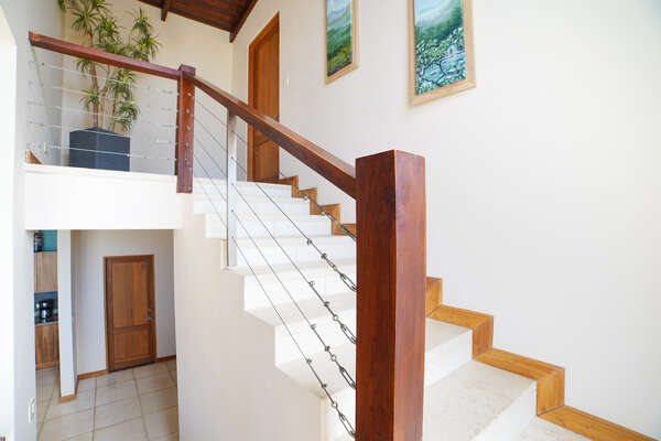 Ascend to Luxury: Stairs to the Master Bedroom.