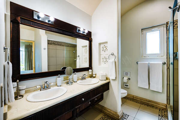 #4 Master suite – His and Hers double sink bathroom, each with its own side, and a shower.