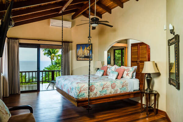 Welcome to the master bedroom, with its open spaces and breathtaking views.