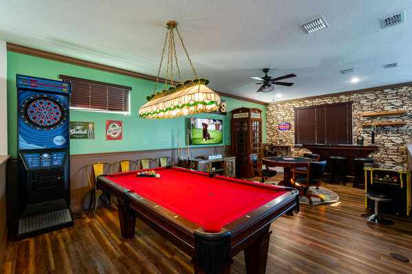 Loft bar showing  pool table and darts