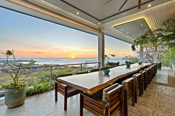 Dine in elegance with a table that offers a mesmerizing view of the ocean