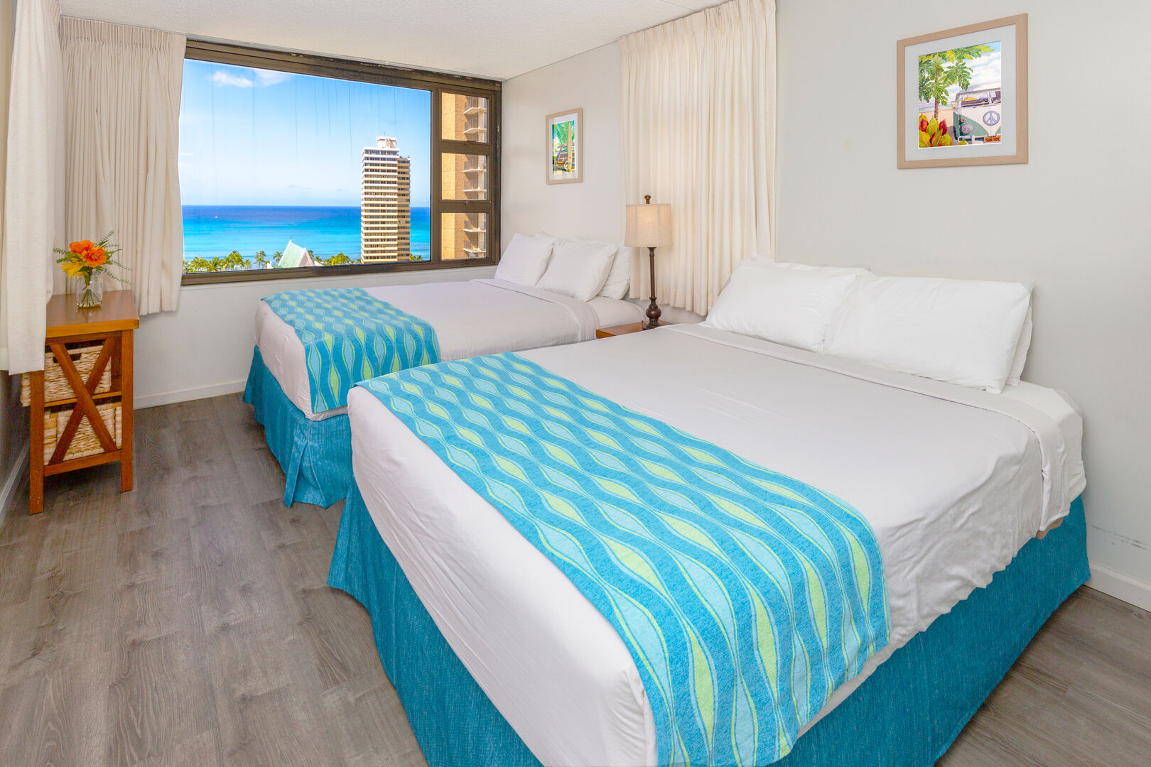 Have a comfortable sleep in your bedroom with two queen-size beds plus a stunning ocean view!
