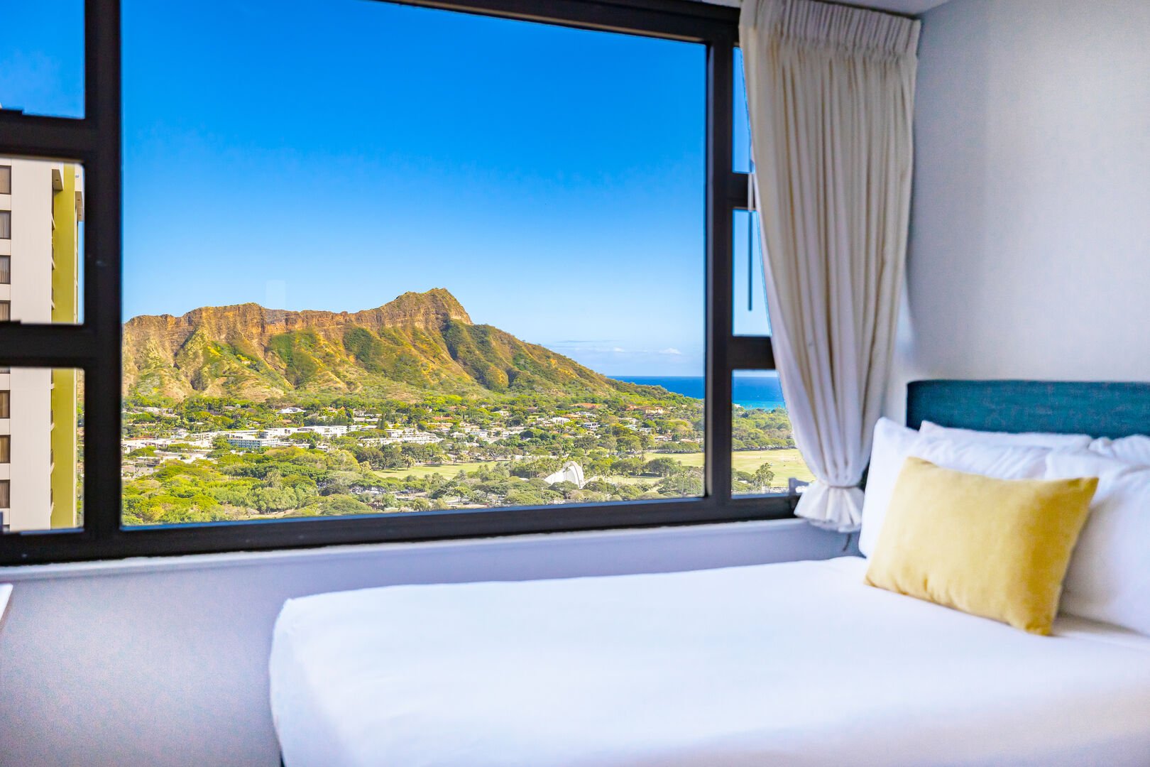 Stunning Diamond Head and ocean views from your bedroom