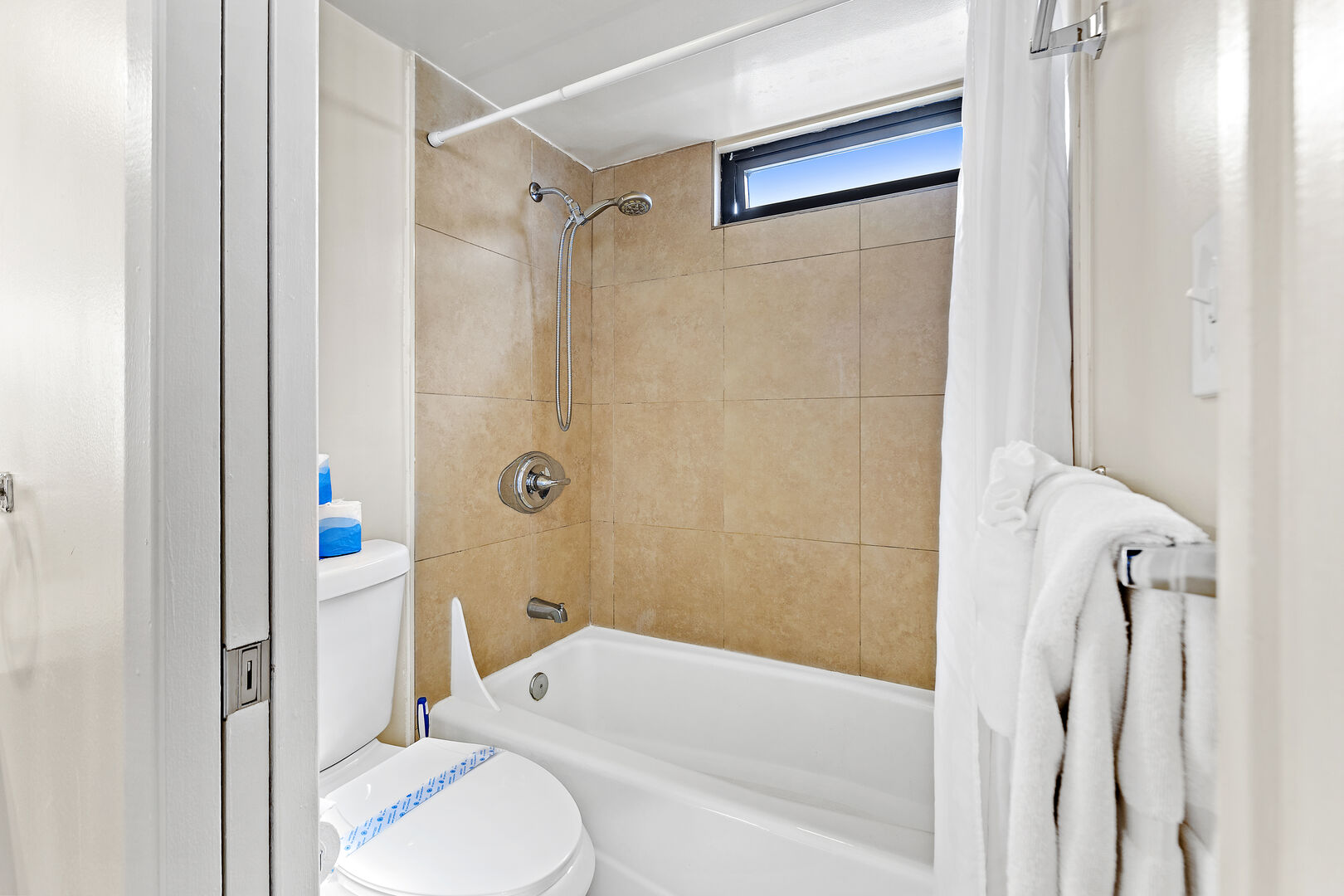The full bathroom features a tub and shower combination!