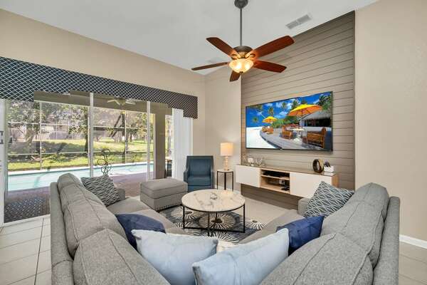 Relax under the ceiling fan on the comfortable sectional couch