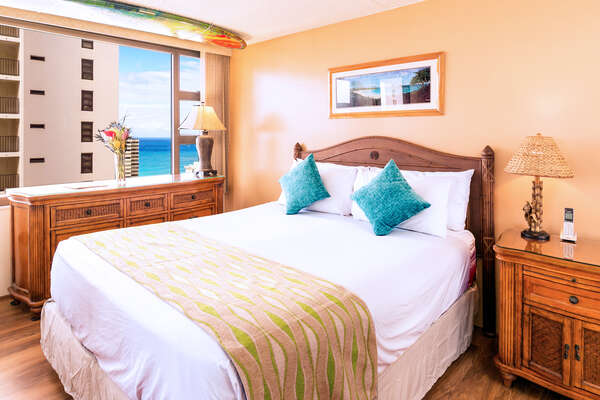 Relax on your king-size bed in the bedroom with beautiful ocean views from your window!