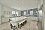 Expansive Kitchen with Breakfast Bar Seating