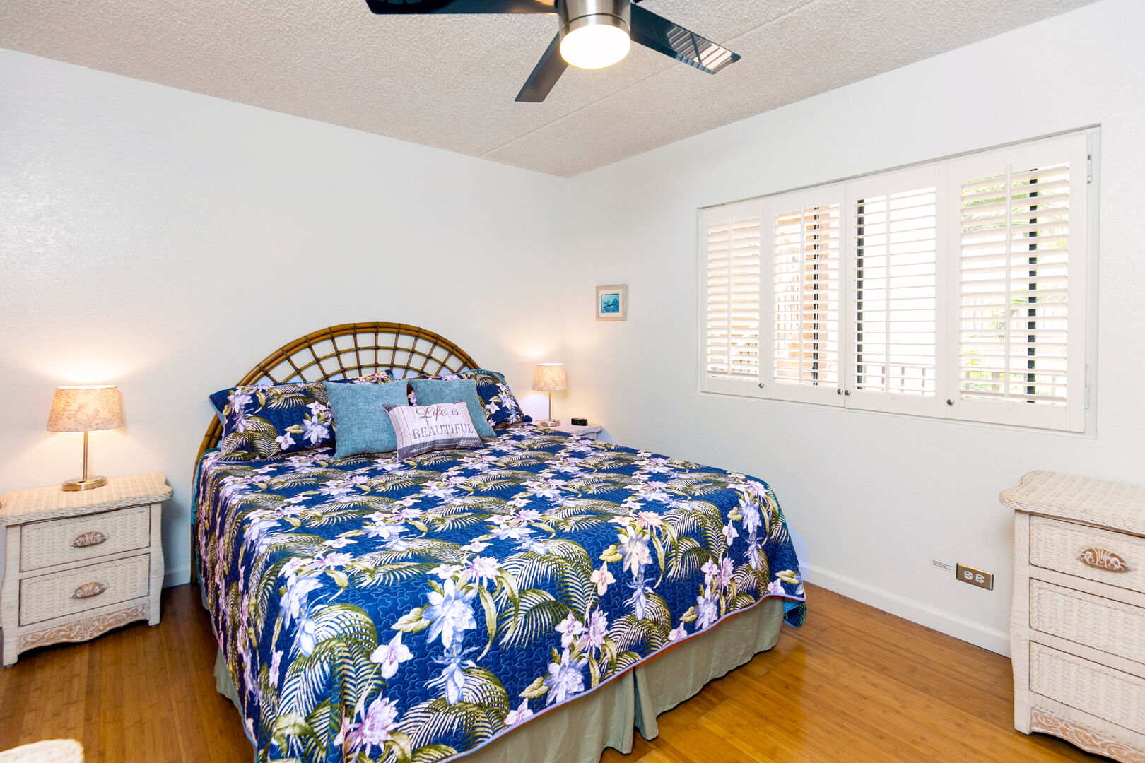 Bedroom with king bed and ceiling fan