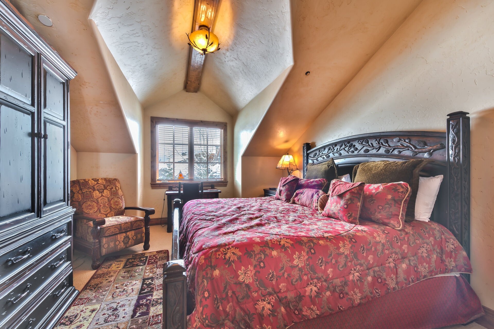 Upper Level Master Bedroom 2 with a King Bed, TV, and Private Bath