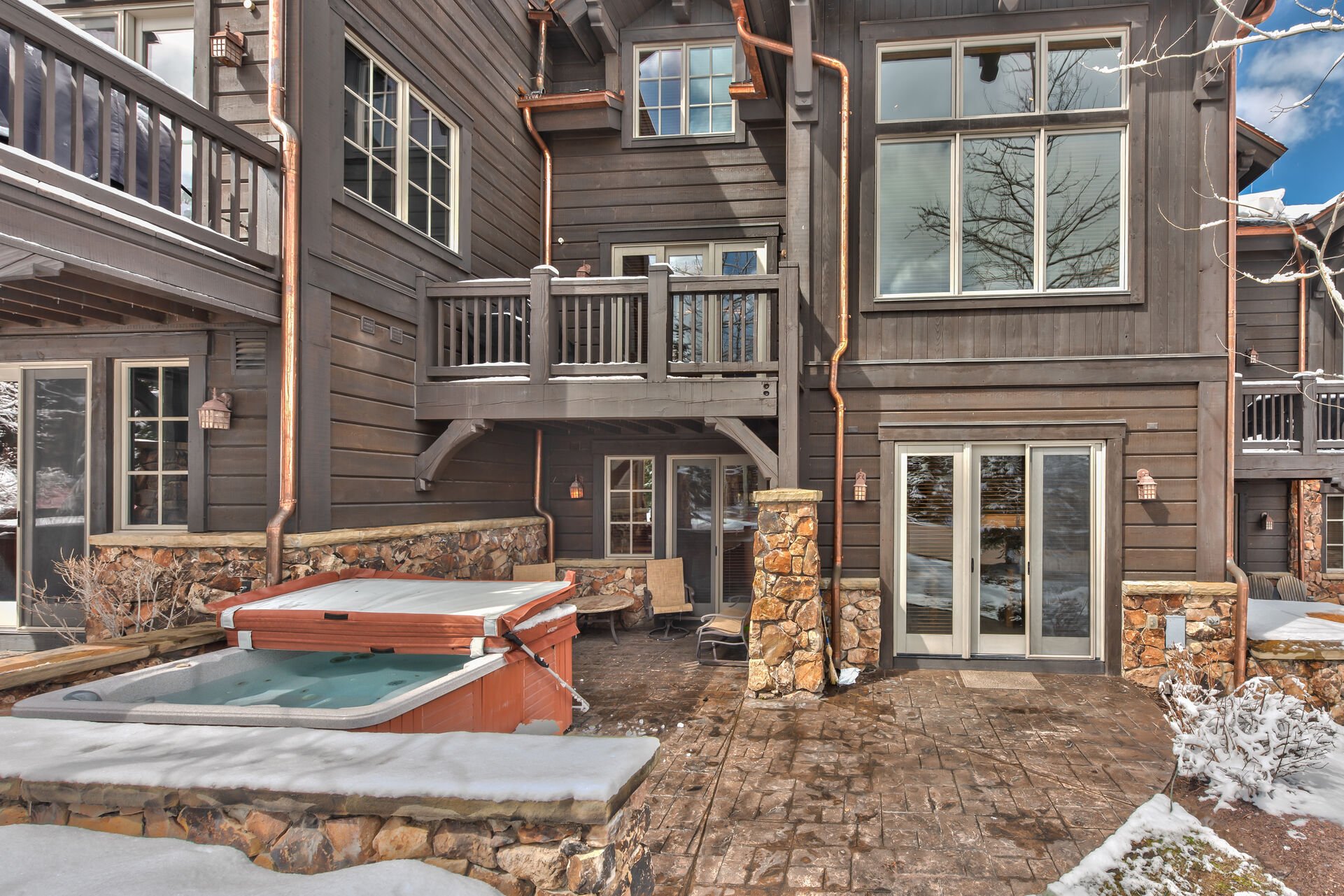 Rear Exterior and Patio with Private Hot Tub