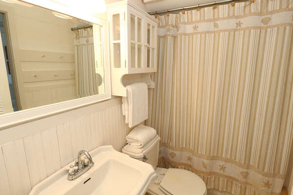 Guest Bathroom with bathtub-shower combination