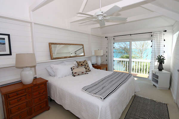 Master Bedroom with king bed, bay front vistas and open balcony