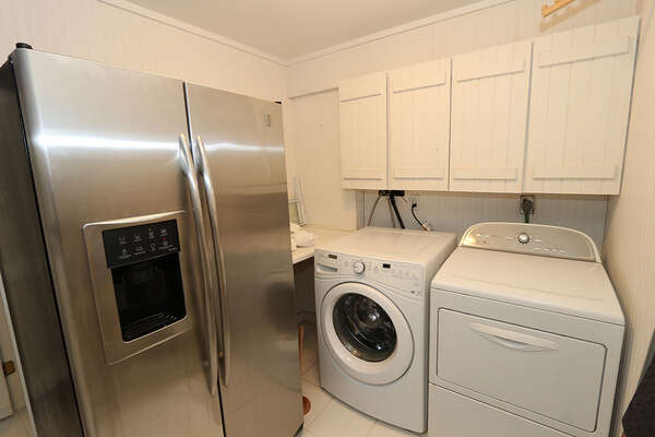 2nd refrigerator on ground level, in washer/dryer area