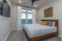 Bedroom #4- Queen size bed with full closet and private en suite bathroom and 44