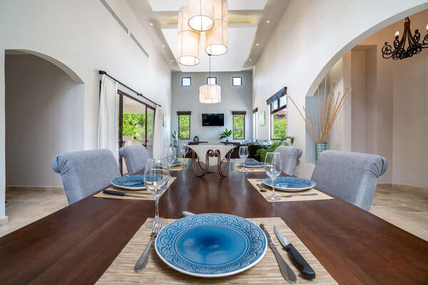 Step into the lap of luxury in Casa Bonita Beach's dining room, adorned with elegant blue and grey accents.