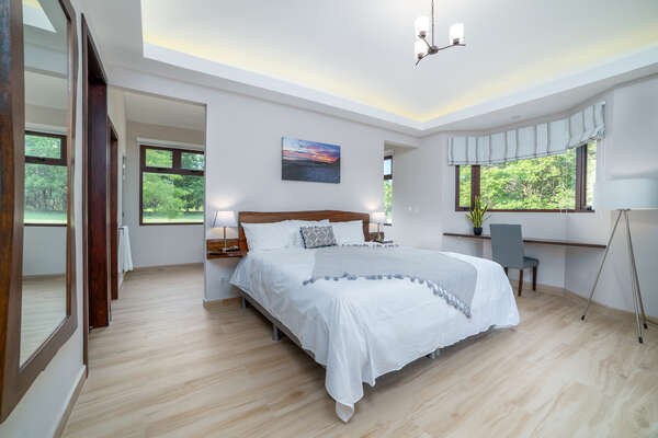 Time to explore the Master Bedroom 1 with a super spacious king-sized bed.