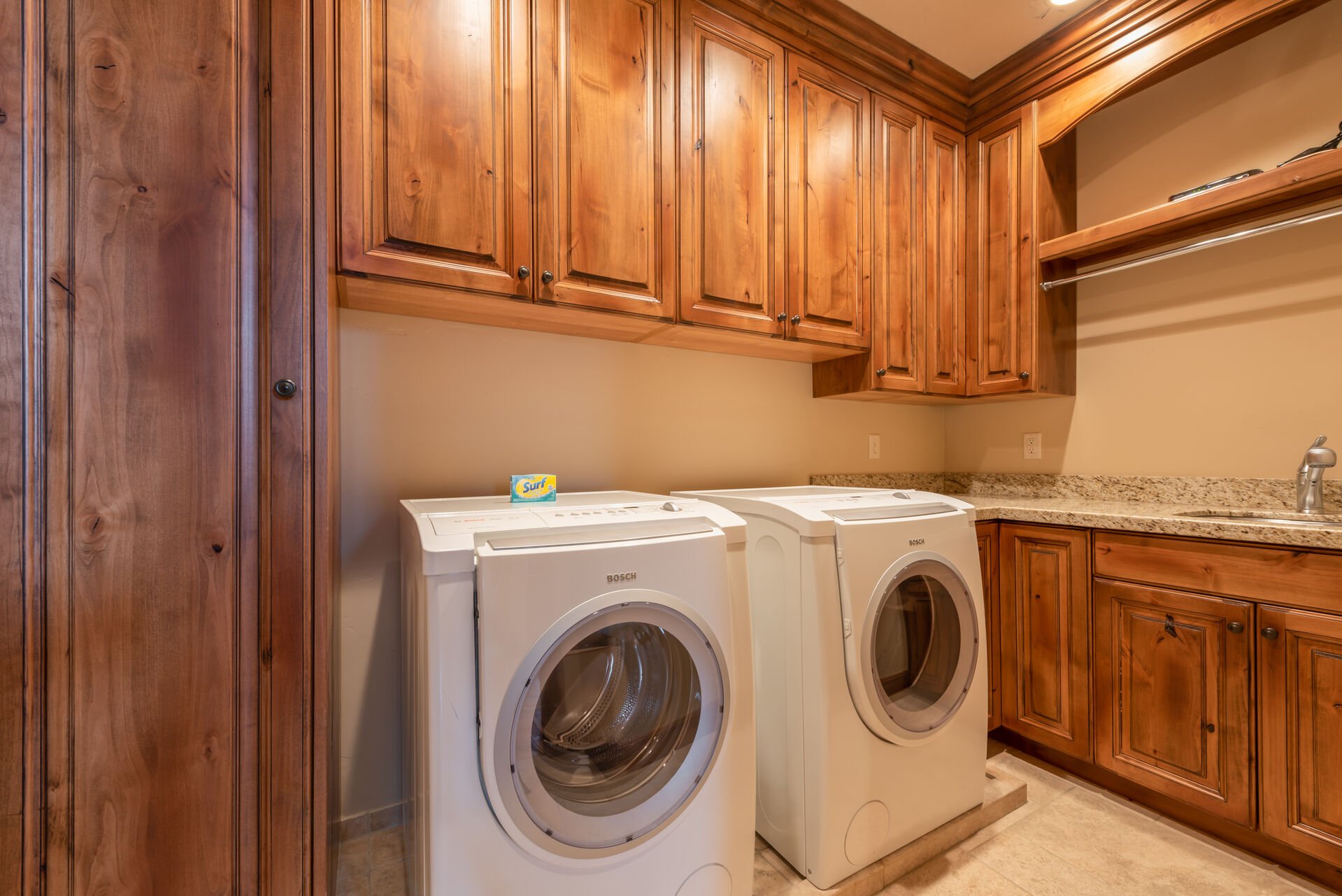 Laundry Room with Side-By-Side Washer and Dryer