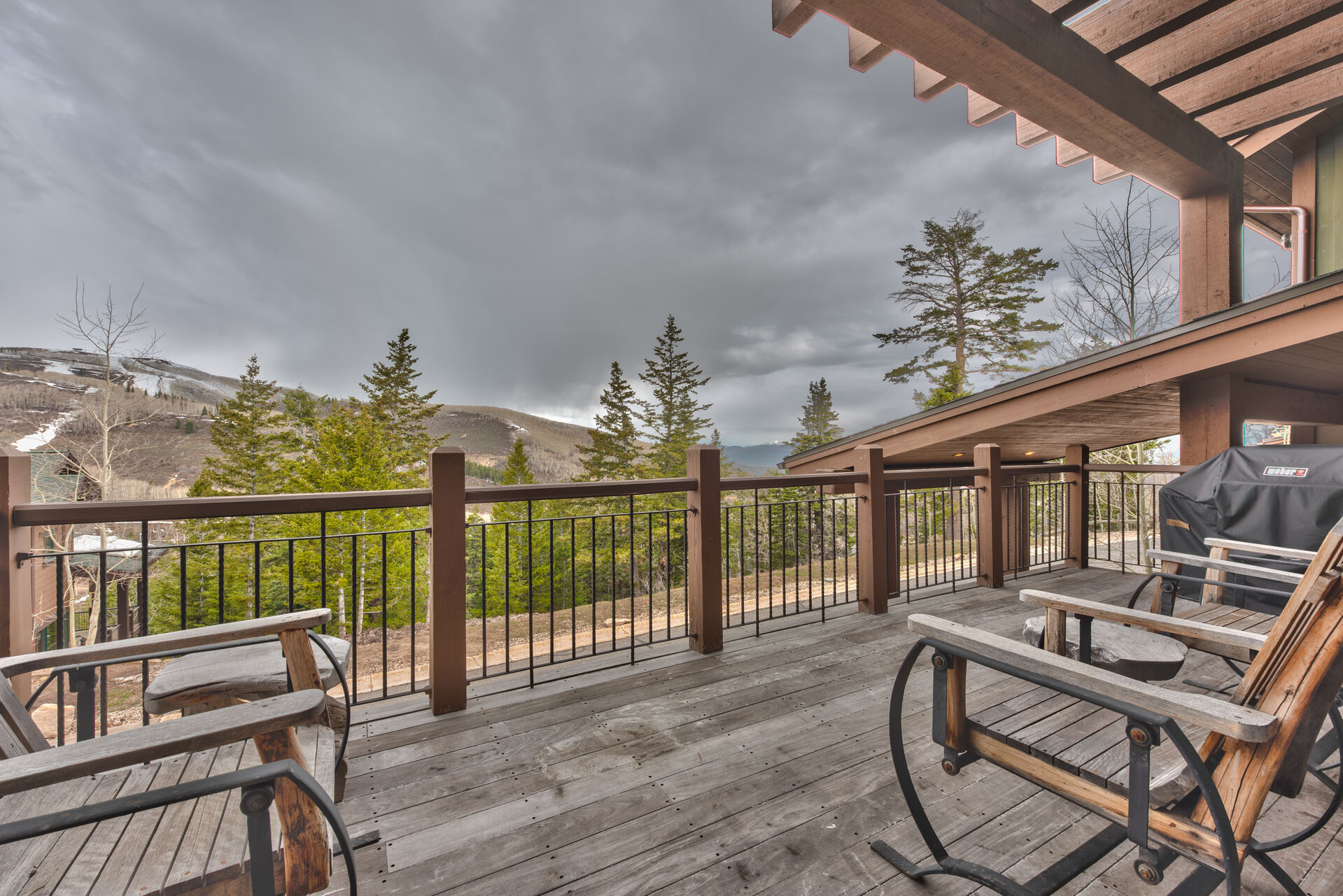 Private Deck Off the Living Room with Seating, Mountain Views, and a gas BBQ