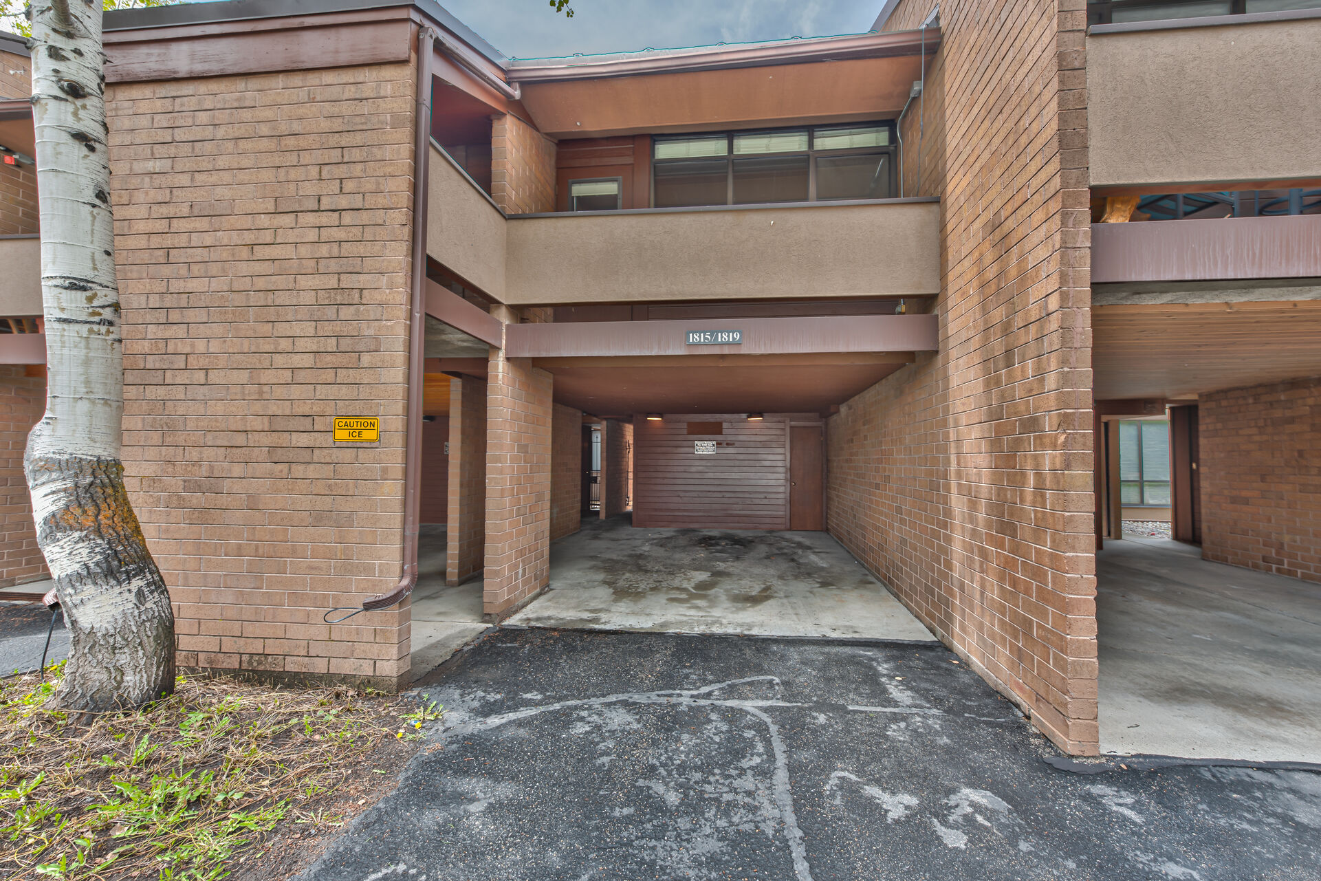 Carport Parking for One Car with Additional Parking in the Driveway