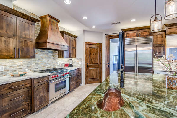 Gourmet Kitchen with Stainless Steel Appliances and Granite Countertops