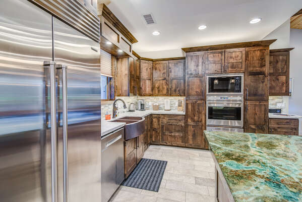 Fully Equipped Chef's Kitchen with Double Ovens and a SubZero Refrigerator
