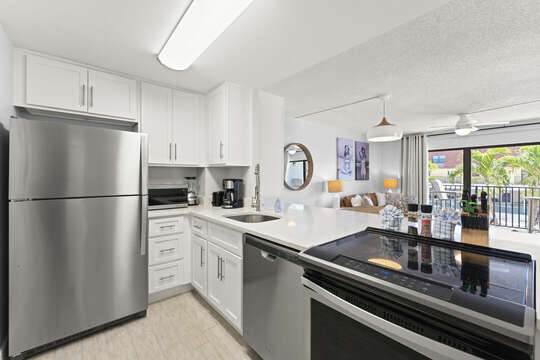 Spacious open and fully stocked kitchen (kitchenware and salt and pepper) allowing for easy meals in