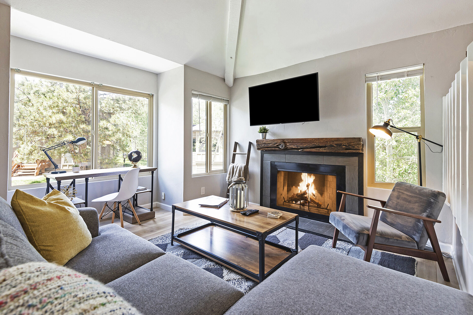 Cozy Living Room with a Sleeper Sofa, Wood Fireplace, 50