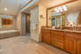 Master Bath 1 with Dual Granite Counter Sinks, a Large Soaking Tub and Separate Tile Shower