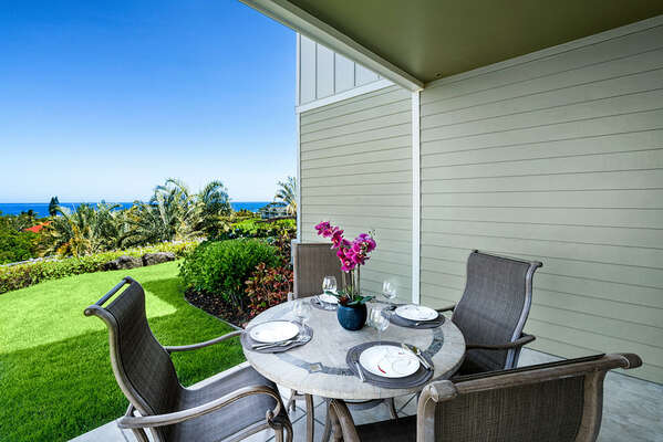 Covered lanai perfect for outdoor meals and to take in the Ocean Views