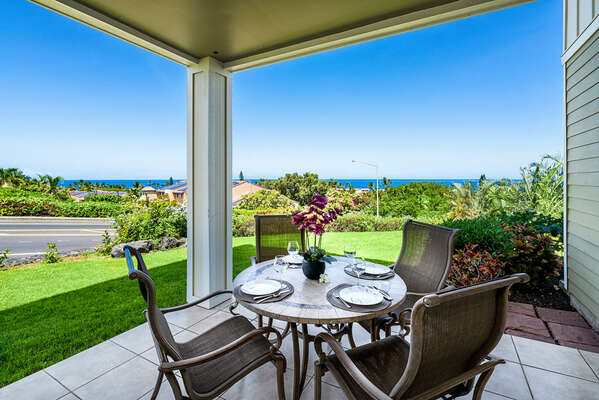 Covered lanai perfect for outdoor meals and to take in the Ocean Views