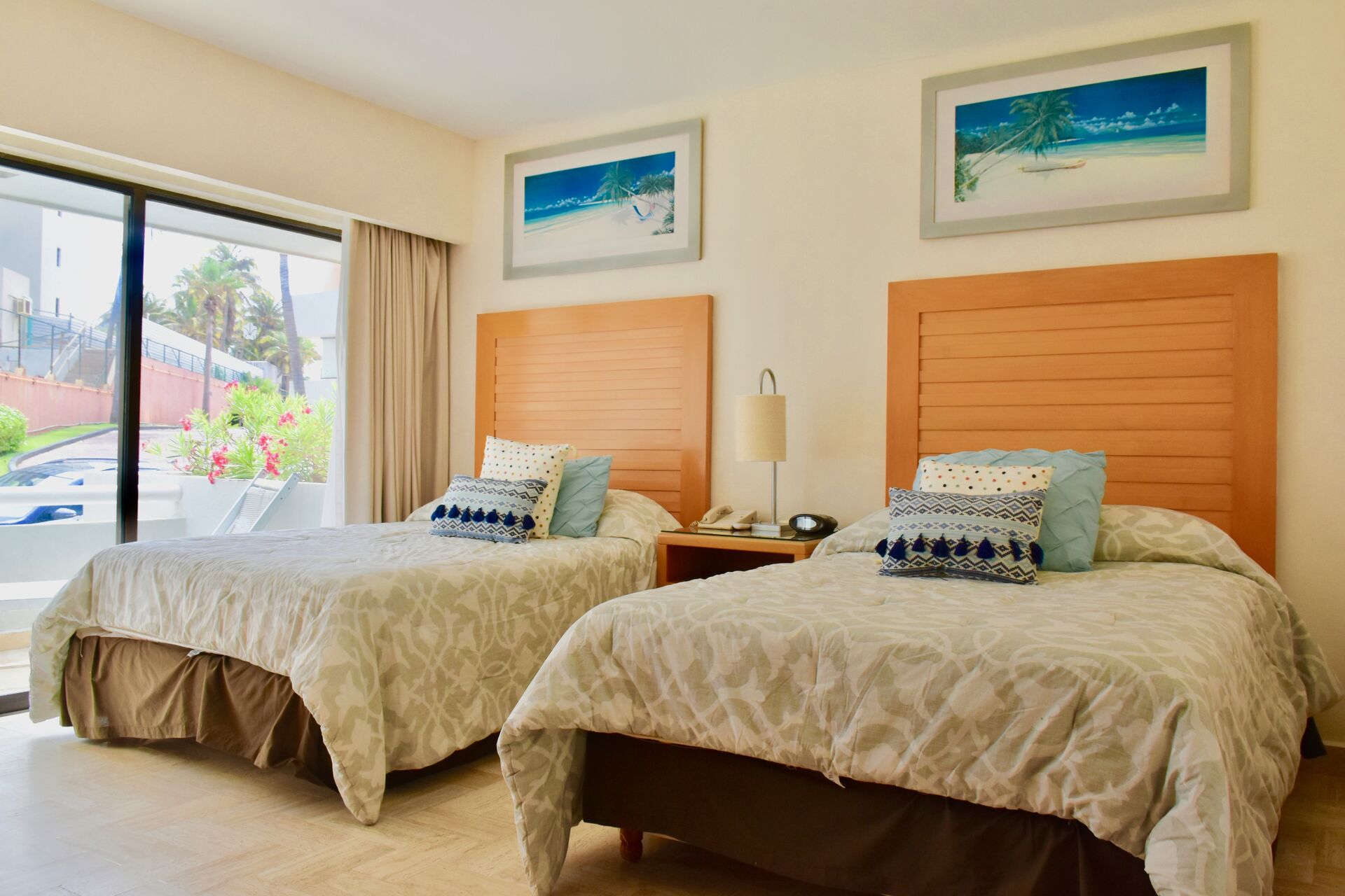 Amazing bedroom with 2 double beds in the 2rd floor with balcony and sea view