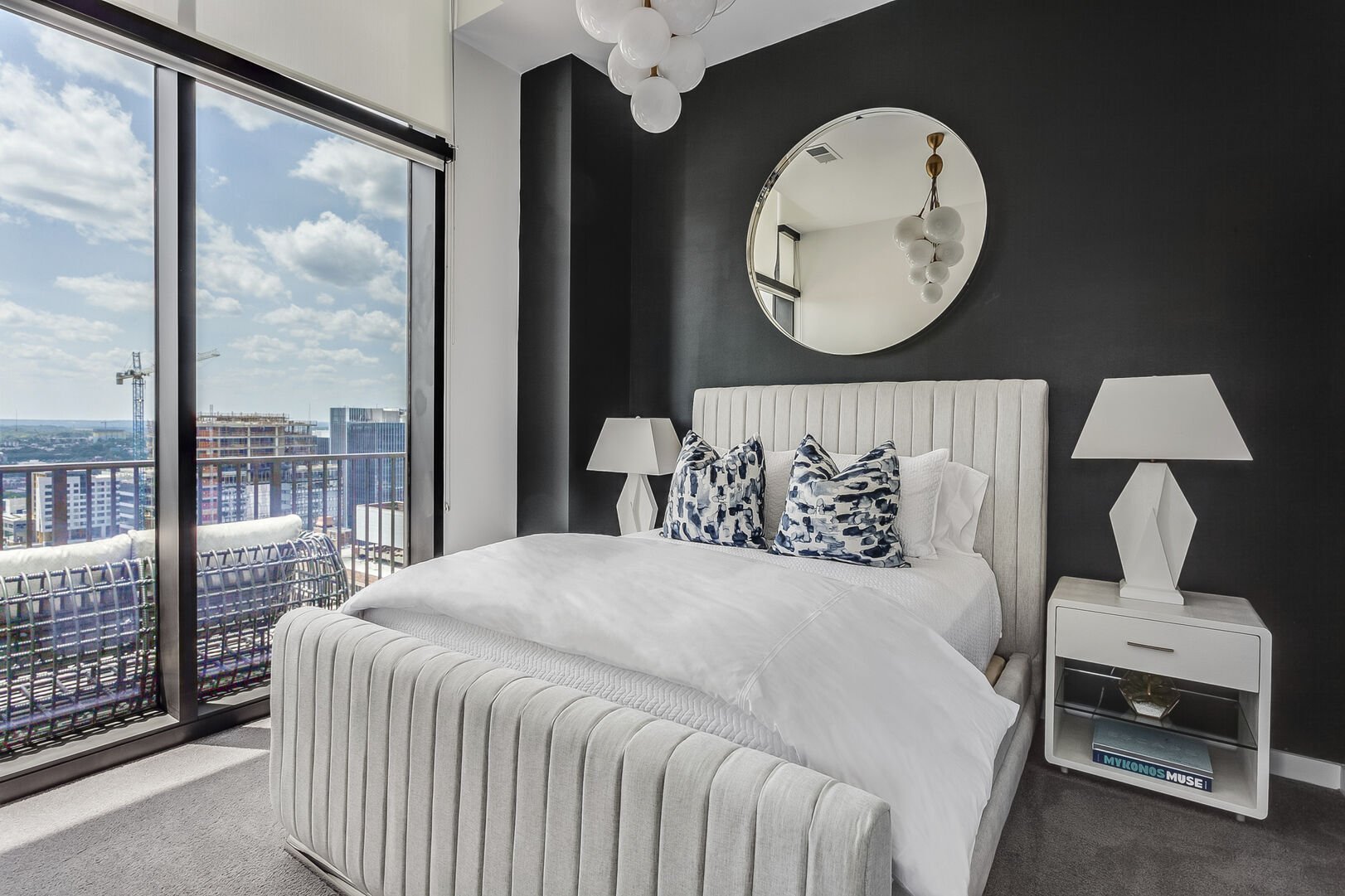 Guest Bedroom Includes Bed, Two Side Tables, and Stunning Views.
