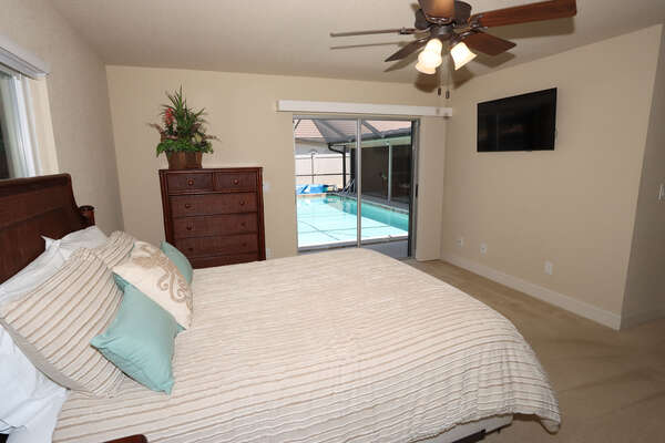 Queen Guest Bedroom 3. Flat screen TV and access to lanai