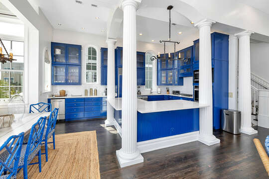 This stunning Kitchen makes for a lively gathering place in the home!