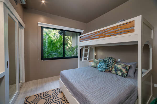 Come into Bedroom 4 a cozy bunk room perfect for a fun-filled stay.