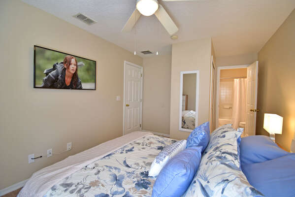 Master bedroom 2 showing en-suite bathroom and flatscreen TV