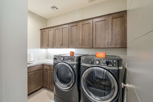 Laundry Room with Full Size Front Load Washer and Dryer