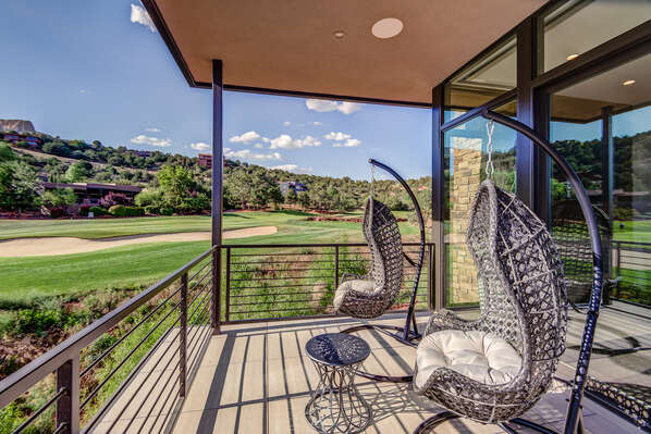 Private Deck off the Master Bedroom with Hanging Chairs and Exquisite Views