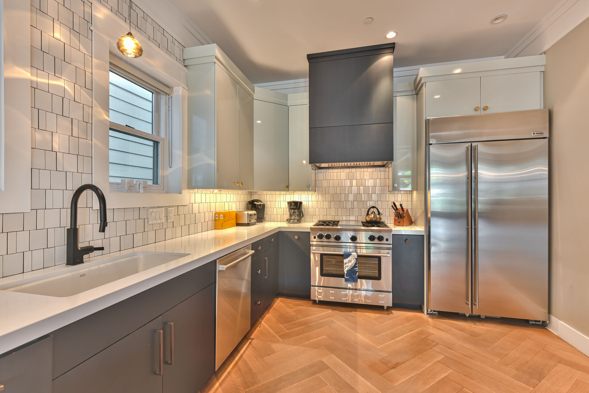 Stainless Steel Appliances, Including a 4-burner Gas Range with a Griddle and a Wine Fridge