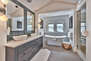 Modern Amenities with Dual Sinks, a Large Soaking Tub and Separate Tile Shower
