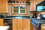 Fully Equipped Kitchen with a 4-Burner Gas Range with Extra Large Oven