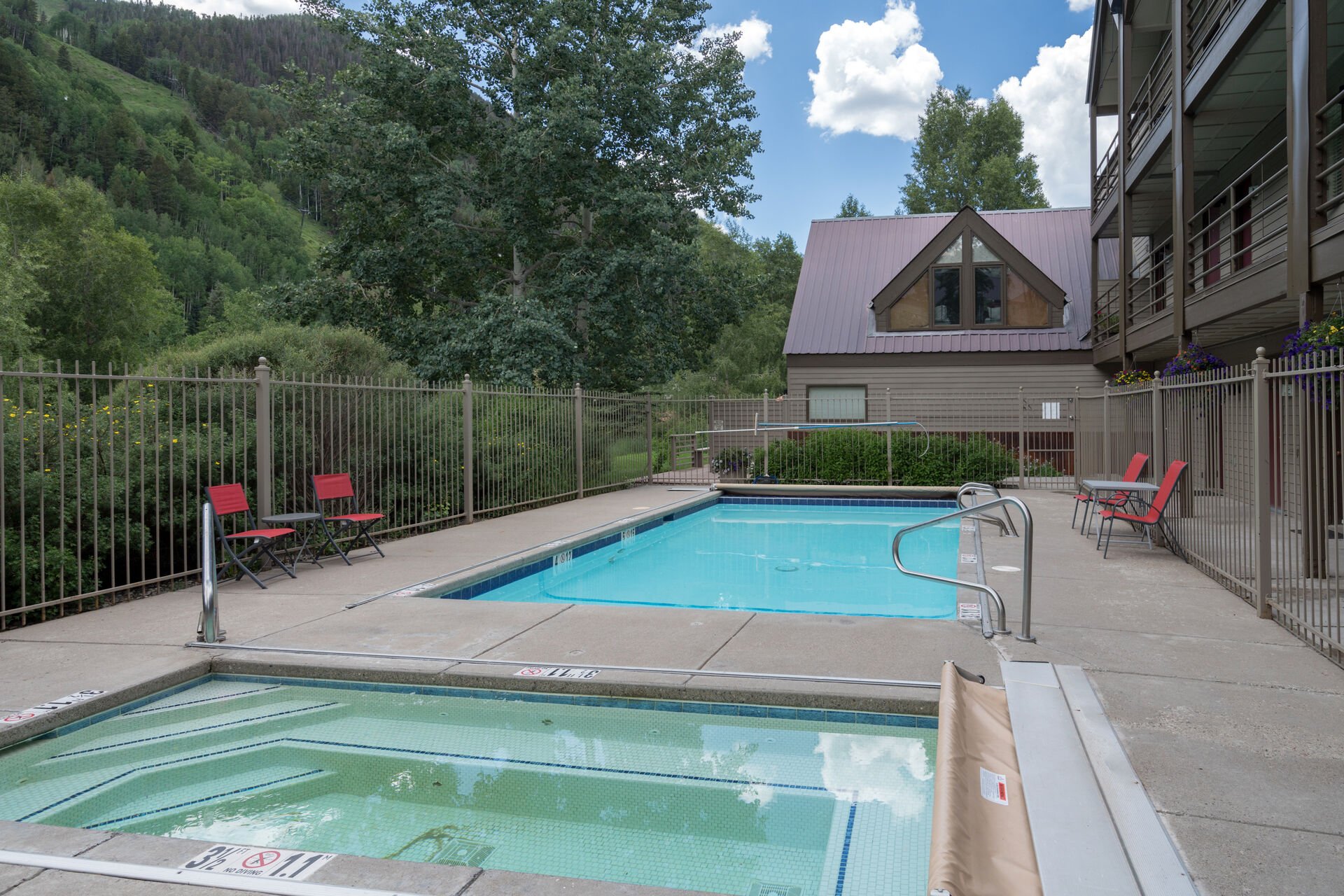 Outside pool and hot tub area near our Telluride studio rental