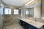 The master bathroom was renovated December 2022 with a beautiful double vanity and oversized shower.