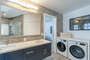 The washer / dryer are also located in the master bathroom.